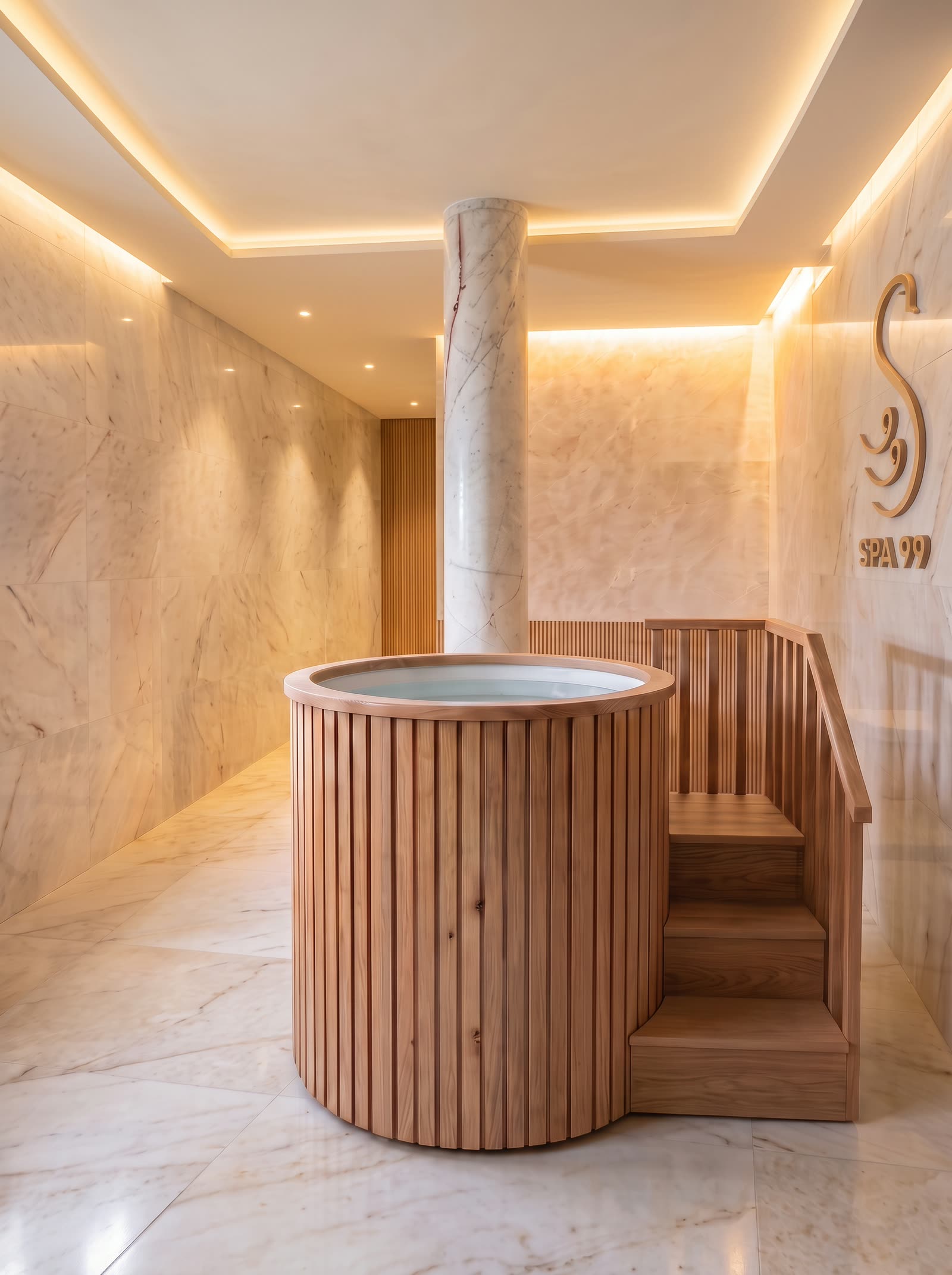 A round oak cold plunge tub with steps, in a marble room